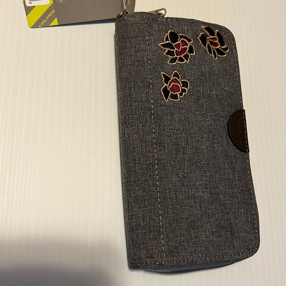 Grey wallet 8 inches - 12 slots for card. New with tag